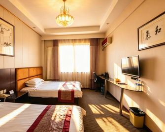 Super 8 by Wyndham Jinan International Airport - ז'ינאן - חדר שינה