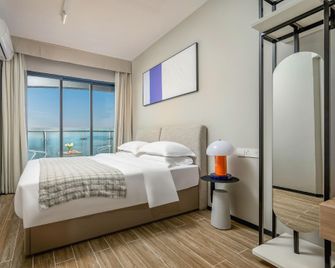 Poltton Century Hotel - Huizhou - Bedroom