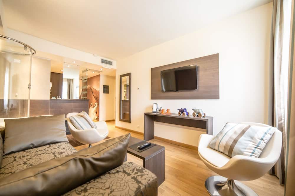 آيتش بي أوستا هوتل آند بالكوني سبا - اوستا - غرفة معيشة