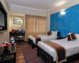 Hotel Sarowar - Pokhara - Phòng ngủ