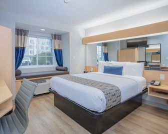 Microtel Inn & Suites by Wyndham Albertville - Albertville - Bedroom