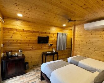 Vasant Kunj Nature Resort Udaipur - Udaipur - Schlafzimmer