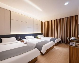 Homeinn Pebble Hotel (Qingdao Chengyang North Bus Station) - Qingdao - Habitación