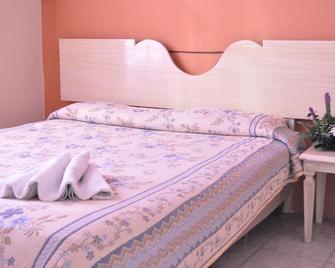 Hotel Metropolitan II - Irapuato - Schlafzimmer