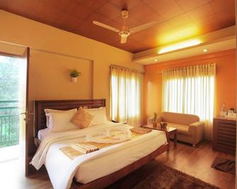 Grand Plaza - Munnar - Phòng ngủ