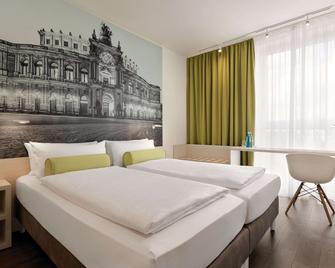 سوبر 8 باي ويندام ماينز زولهافين - ماينز - غرفة نوم