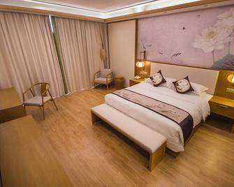 Jiuhuashan Rongxi Manor Hot Spring Hotel - Chizhou - Slaapkamer