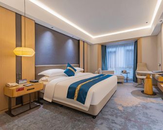 Taohualing Hotel (Yichang) - Yichang - Bedroom