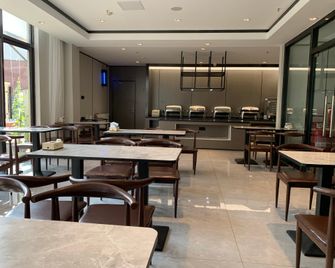 Hanting Express Qingdao Haier Industrial Park - Qingdao - Restaurante