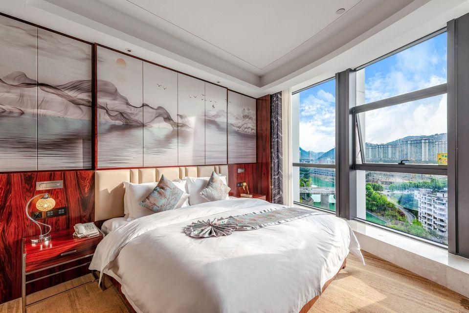 Zhusha Hotel - טונגרן - חדר שינה