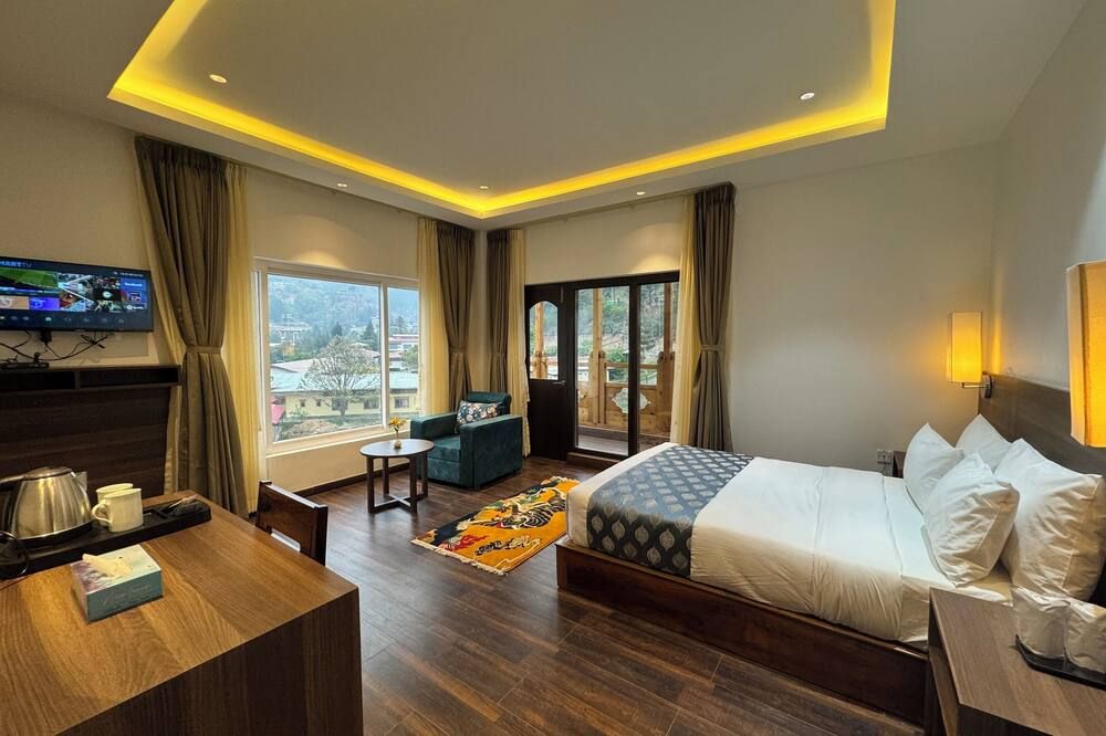 أسورا هوتل - ثيمفو - غرفة نوم