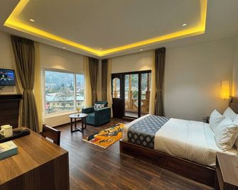 أسورا هوتل - ثيمفو - غرفة نوم