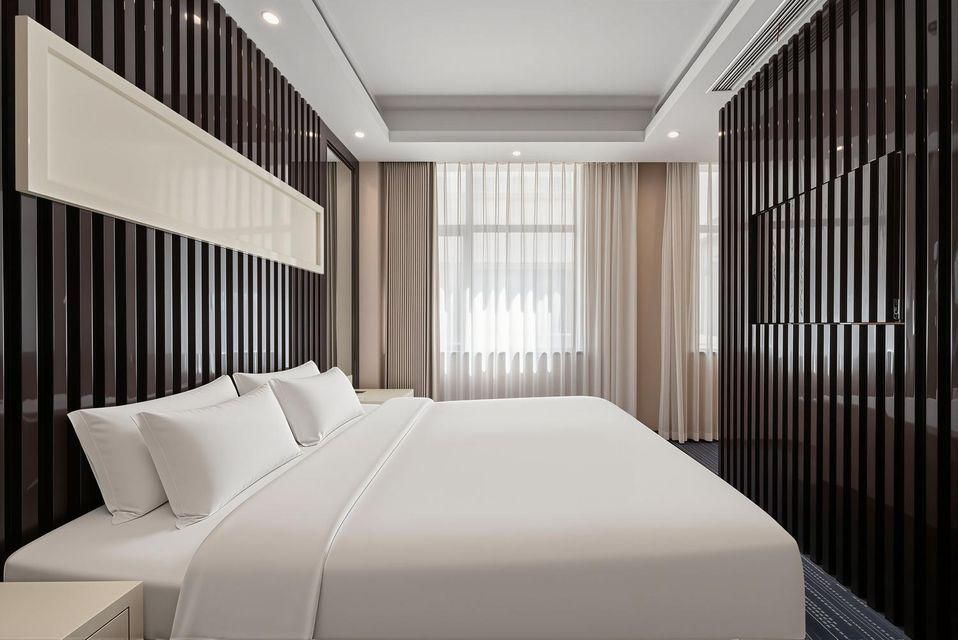 Shanghai Xi En Hotel - שנחאי - חדר שינה