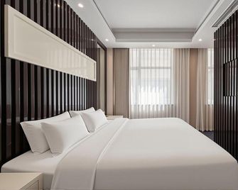 Shanghai Xi En Hotel - Shanghai - Bedroom