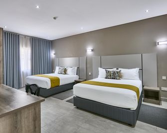 Oasis Hotel - Gaborone - Schlafzimmer