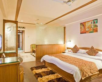 Hotel Amar Vilas - Indore - Camera da letto