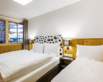Bolodges Apartments by Alpin Rentals - Saalbach - Schlafzimmer
