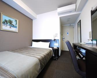 Hotel Route-Inn Satsumasendai - Satsumasendai - Slaapkamer