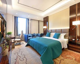 Mehood Lestie Hotel Panyu Branch - Guangzhou - Bedroom