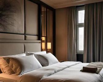 Dream Palace Hotel - עג'מאן - חדר שינה