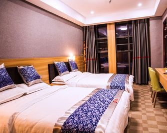 Shell Hotel Jiangxi Fuzhou Linchuan Avenue - Fuzhou - Bedroom