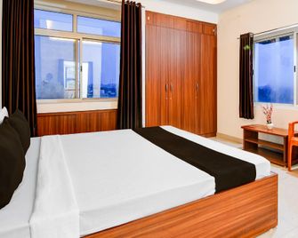 Hotel O M G Garden Balasiring - Ranchi - Bedroom