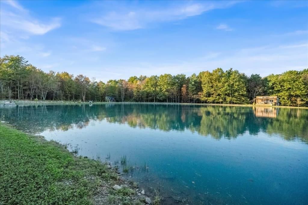 Tiny House On a Tiny Lake Porch at Waters Edge