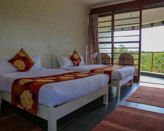 Koi Koi Cultural Village Hotel - Fort Portal - Habitación