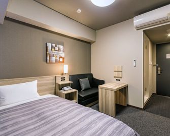 ホテルルートインGrand太田駅前 - 太田市 - 寝室