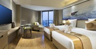 Orange Seasons International Hotel - Haikou - Bedroom