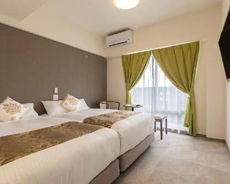 Mr.Kinjo Grand Cats - Ishigaki - Schlafzimmer