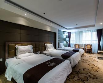 Weihai Huakun Hotel - Weihai - Habitación