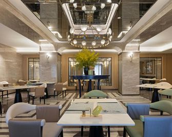 哈尔滨中央大街希尔顿惠庭酒店 - 哈爾濱 - 餐廳
