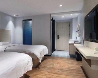 Today Hotel (Guangzhou Baiyun Dayuanli Plaza Dayuan Light Rail Station Branch) - Kanton - Sypialnia
