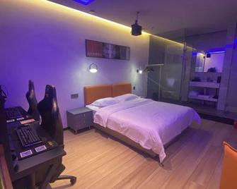 Meili Yangguang Business Hostel - Thẩm Quyến - Phòng ngủ