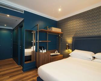 Seven Suites - Roma - Camera da letto