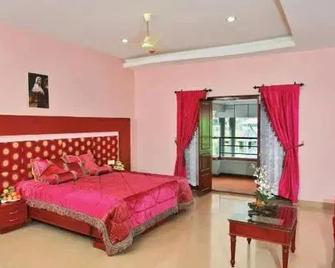 Empire Residency - Tiruvalla - Bedroom