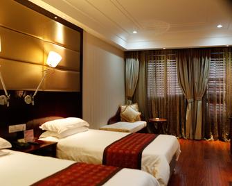 Seventh Heaven Hotel - Xangai - Habitació