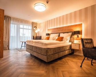 Hotel Meerzeiten - Bensersiel - Bedroom
