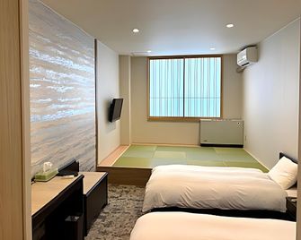 Shiratori Kogen Hotel - Gujo - Slaapkamer