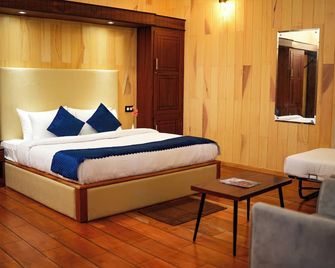 Space Rock Resort - Kalpetta - Schlafzimmer