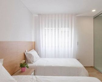 Central Suites - São João da Madeira - Bedroom