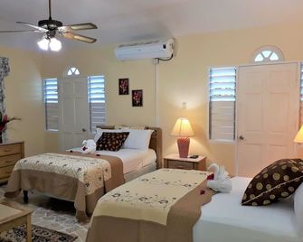 Paradise Inn - Port Antonio - Спальня