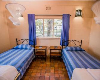 Victoria Falls Restcamp and Lodges - Victoria Falls - Schlafzimmer