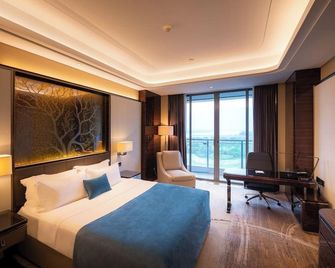 Star Lake Hotel International - Zhaoqing - Bedroom
