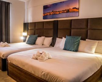 Pebbles Resort - Valletta - Makuuhuone