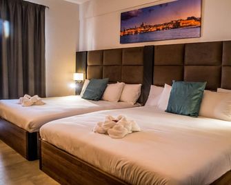 Pebbles Resort - Valletta - Sovrum