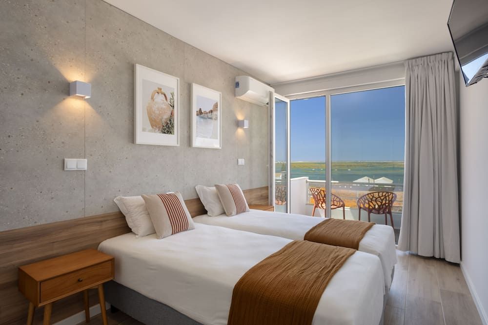 Hotel Made inn Faro - פארו - חדר שינה