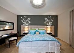 Ciqala Luxury Suites - San Juan - Habitación