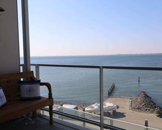 Stylish apartment with sea view - Scherpenisse - Balcón